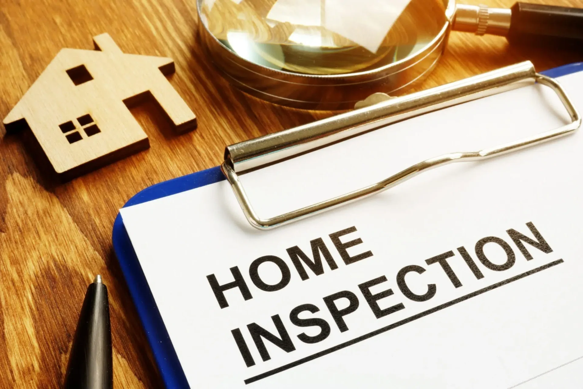 Building inspector checking a house roof during a property inspection in Newcastle